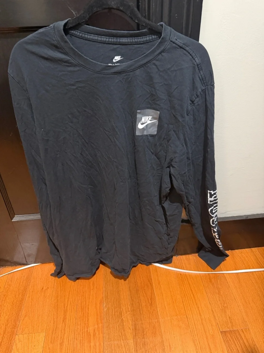 Nike Black Long-Sleeve Logo Shirt with Sleeve Graphic